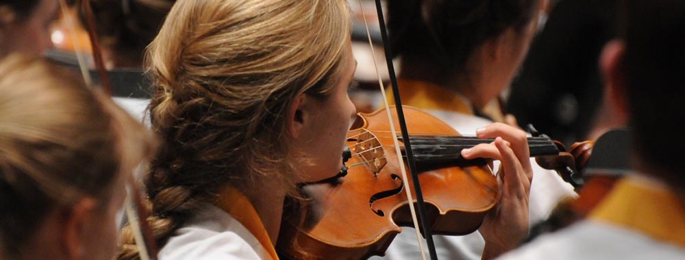 Student string players in concert